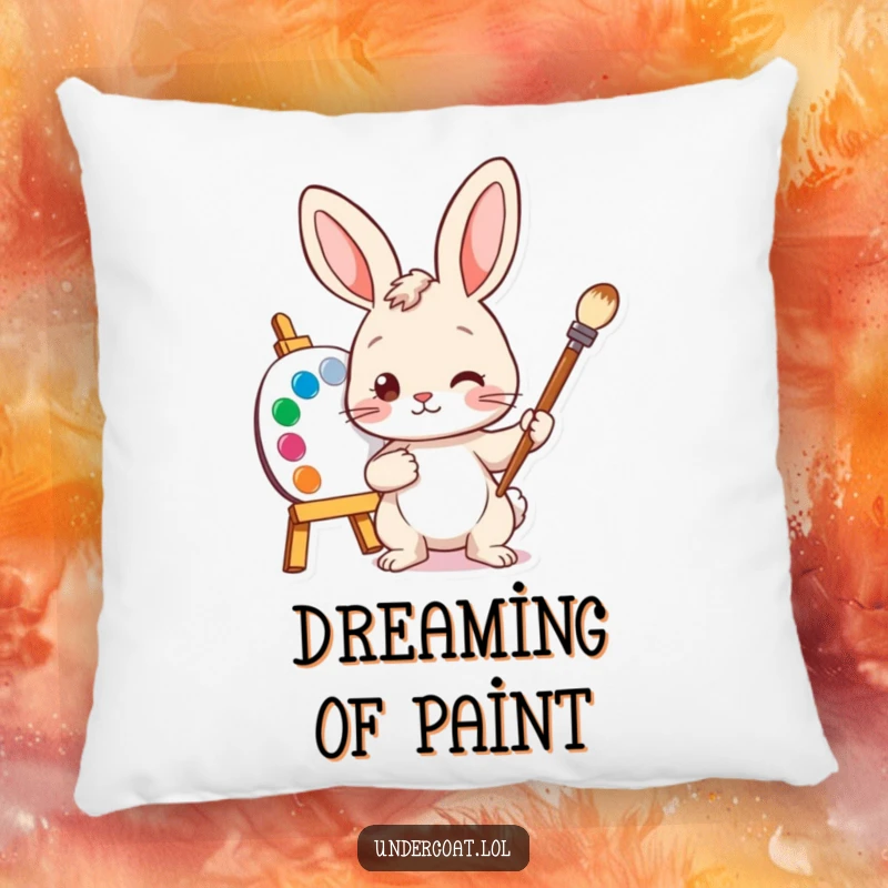 Funny Bunny Artist Pillow depicting a curious bunny artist with a paintbrush and colorful palette, adding whimsy to any room.