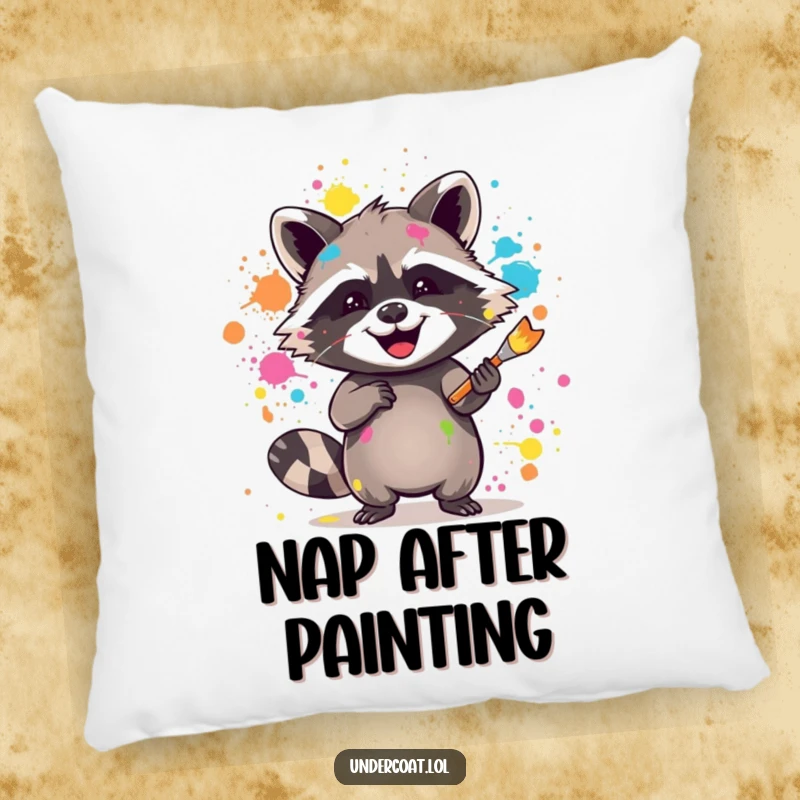 Funny raccoon pillow with a joyful raccoon splattering vibrant paint with a brush, perfect for adding artistic comfort.