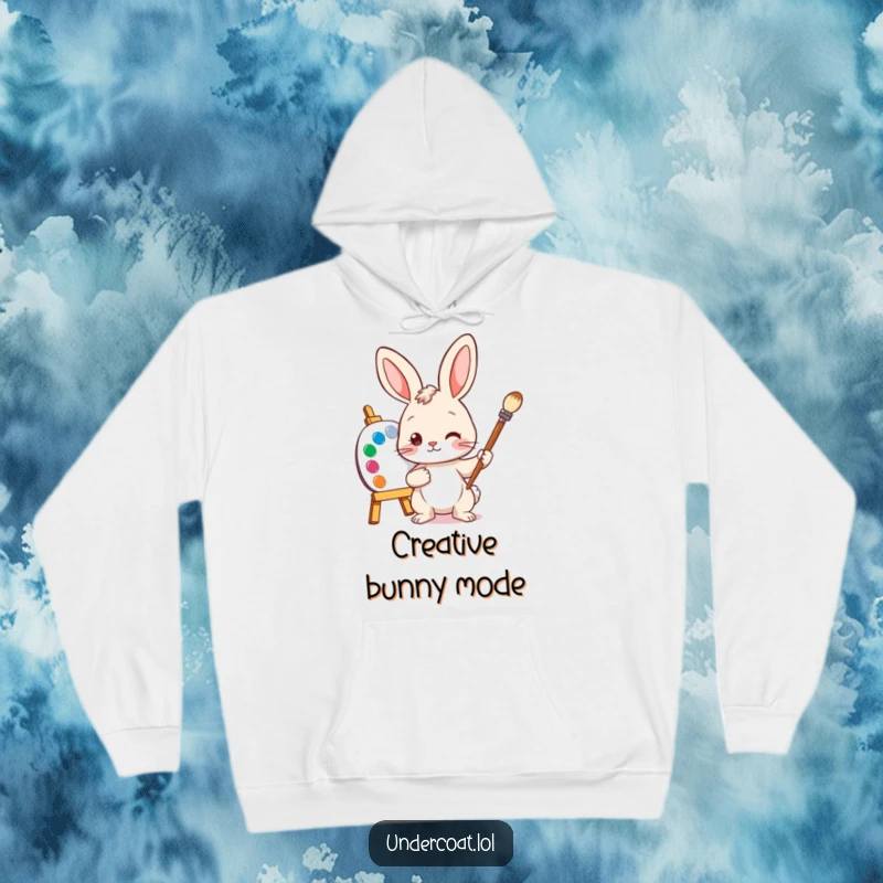 Funny Bunny Artist Hoodie showing a curious bunny holding a paintbrush, ready to create art with a colorful palette nearby.