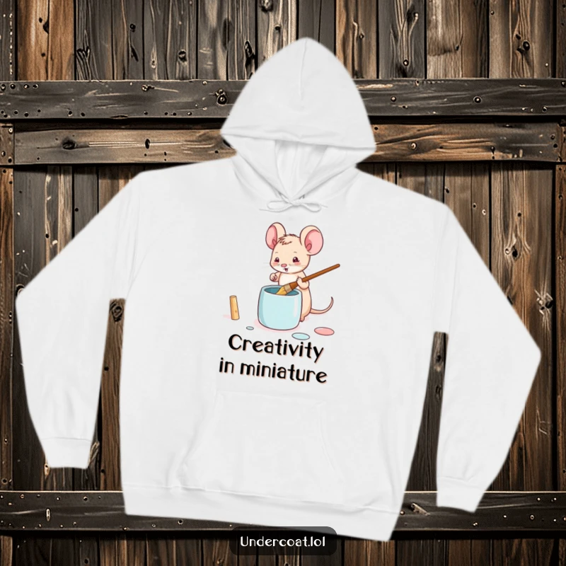 Funny mouse hoodie with a tiny mouse playfully dipping a brush into a paint pot, ideal for cozy creative moments.