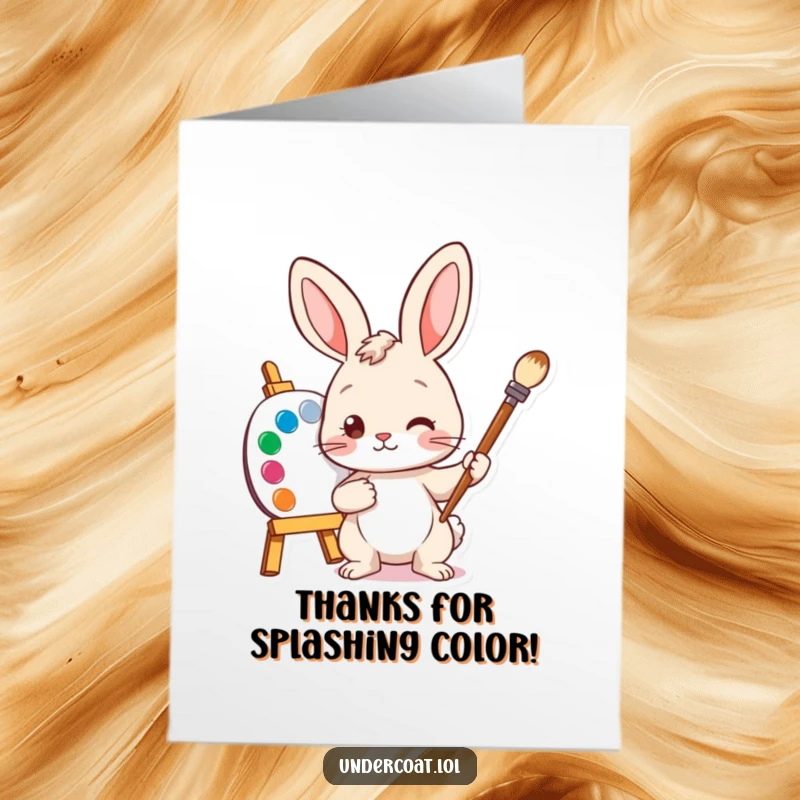 Funny free printable thank you card showcasing a curious bunny artist holding a paintbrush, ready to express gratitude.